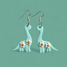 Load image into Gallery viewer, Whimsical Dinosaur flower clay earrings